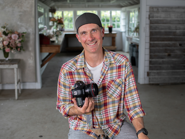 Chris Benzakein holding his camera