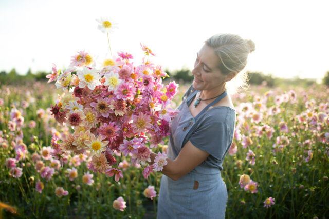 Erin Benzakein with an armload of Floret Original Dahlia ’Petite Floret’